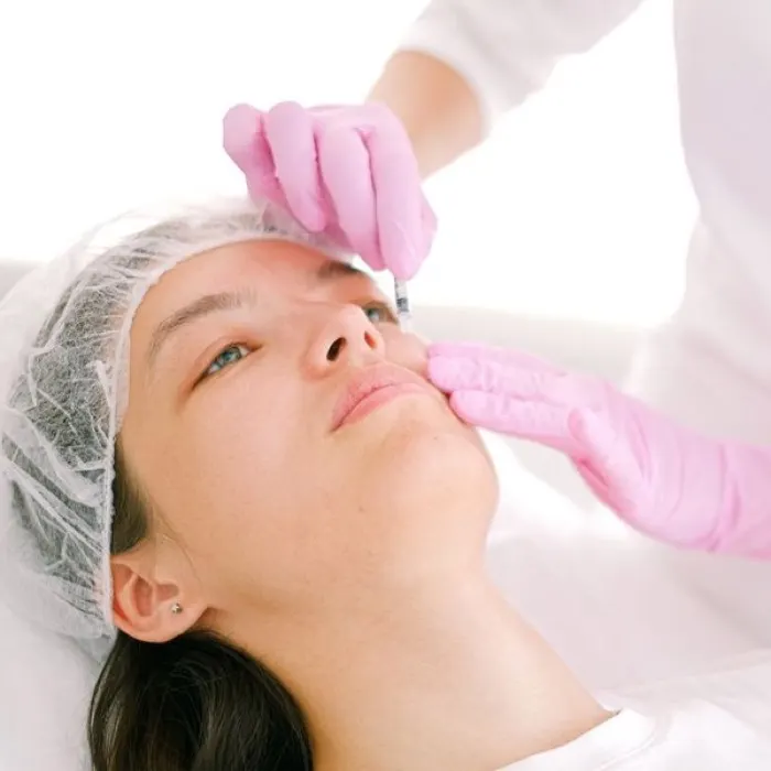 A patient receiving an aesthetic injectable treatment