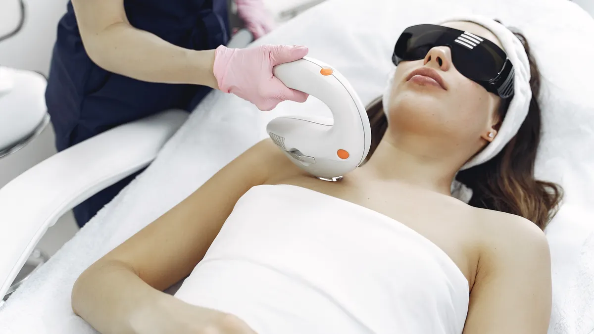 A patient receiving CO2 laser resurfacing
