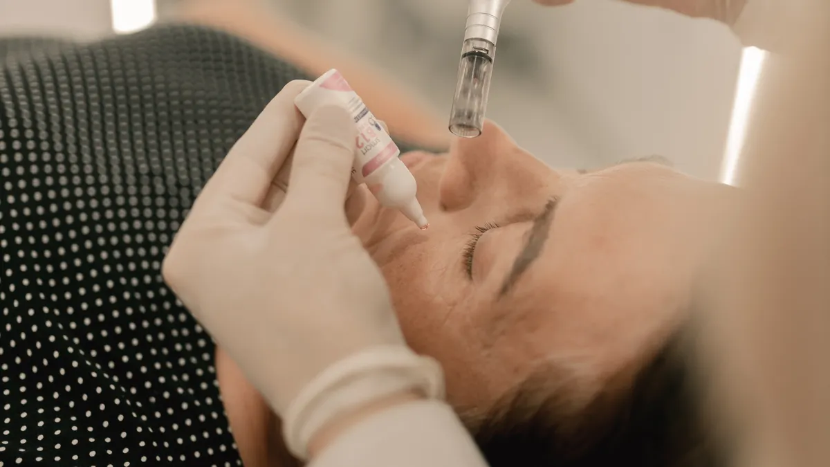 A licensed provider performing RF microneedling